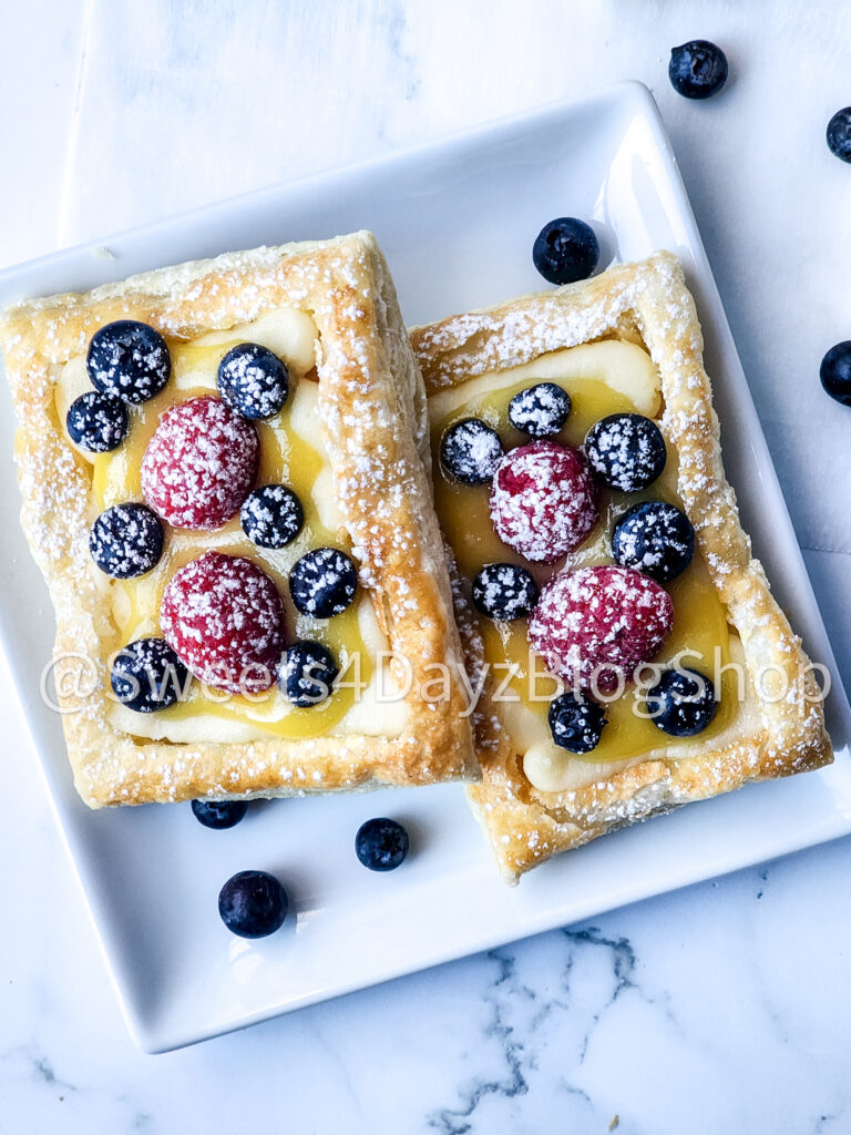 Handheld Puff Pastries on Marble - Image 6