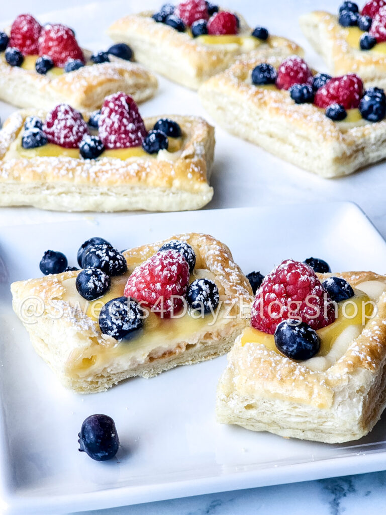 Handheld Puff Pastries on Marble