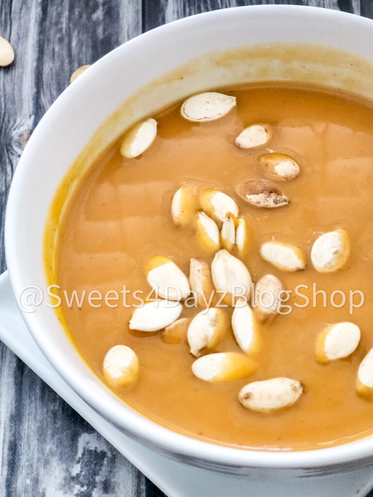 Copycat Panera Bread Autumn Squash Soup on Grey Wood - Image 3
