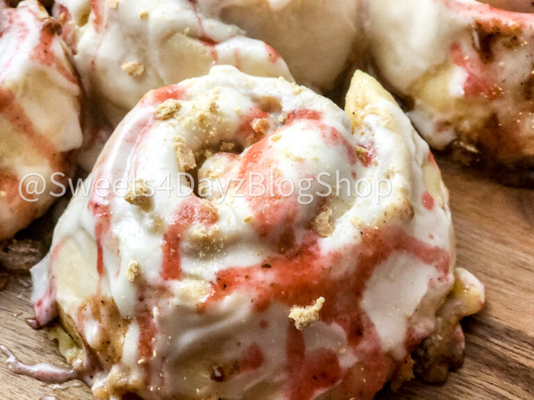 Strawberry Cheesecake Cinnamon Rolls on Grey Wood - Image 5