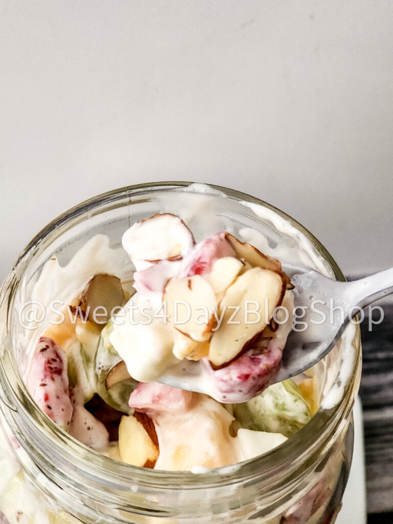 Creamy Fruit Salad on Grey Wood