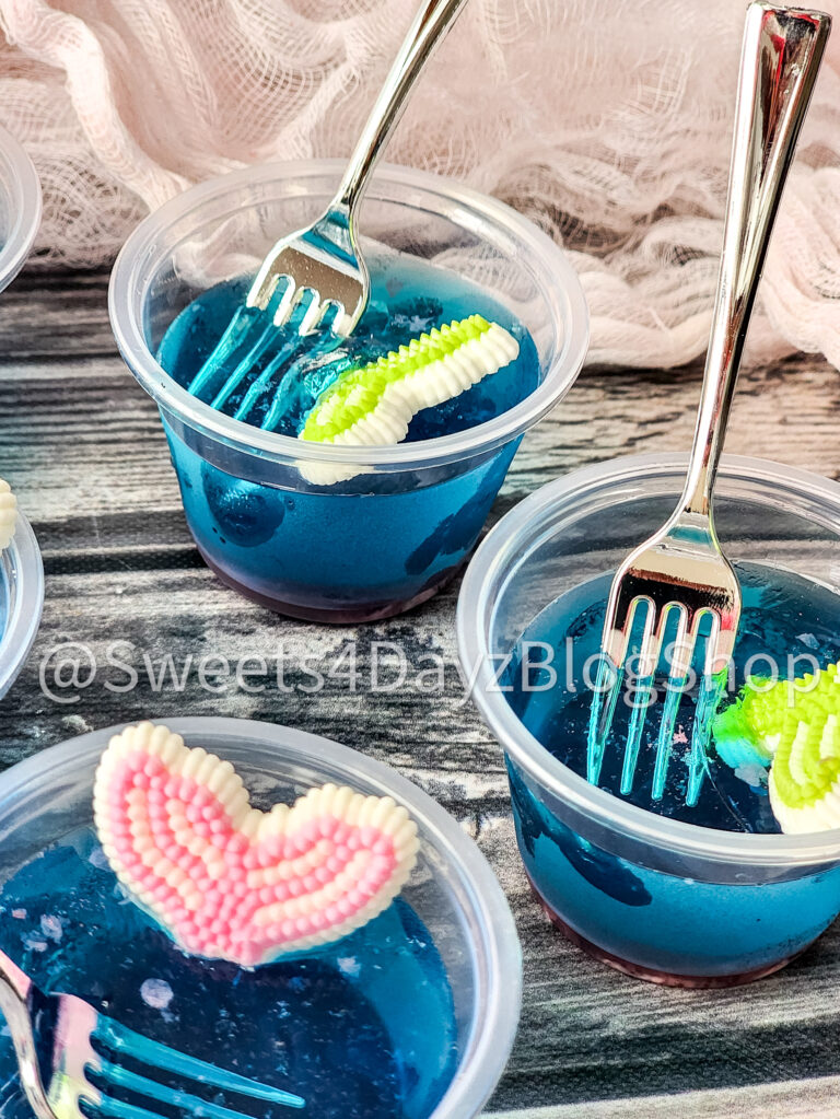 The Little Mermaid Jell-O Cups on Grey Wood - Image 4