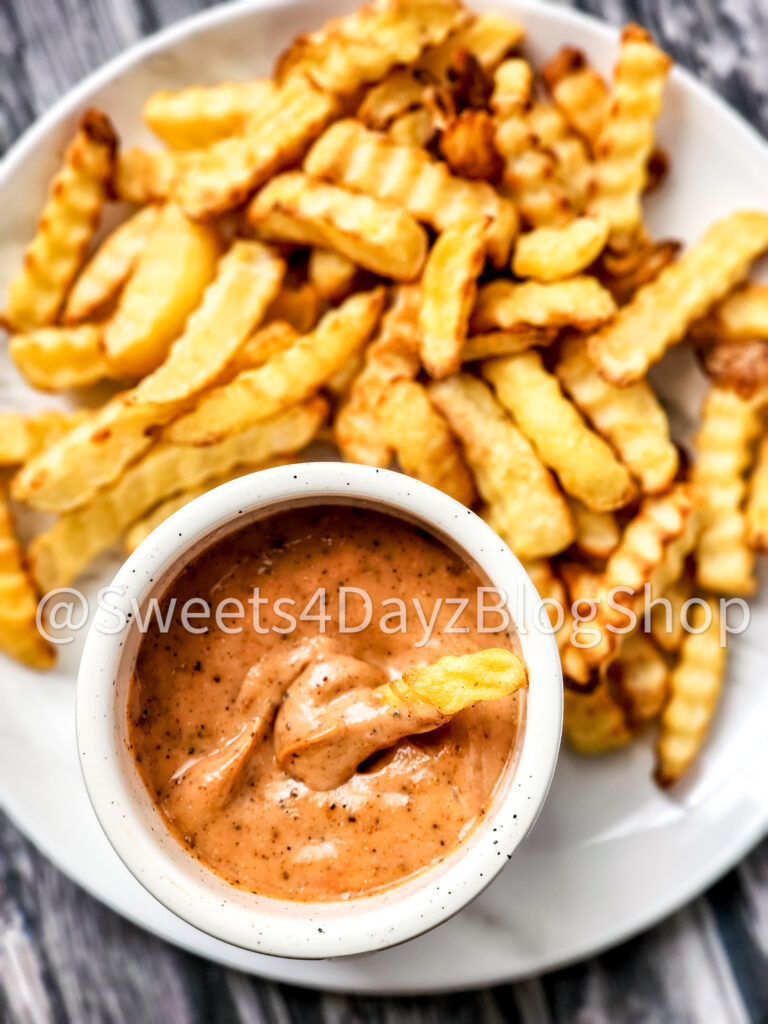 Copycat Raisin Cane's Sauce on Grey Wood - Image 2