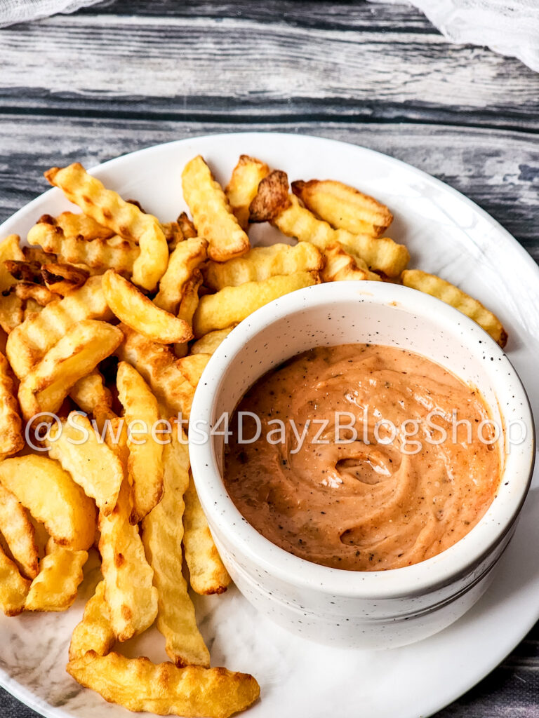 Copycat Raisin Cane's Sauce on Grey Wood - Image 3