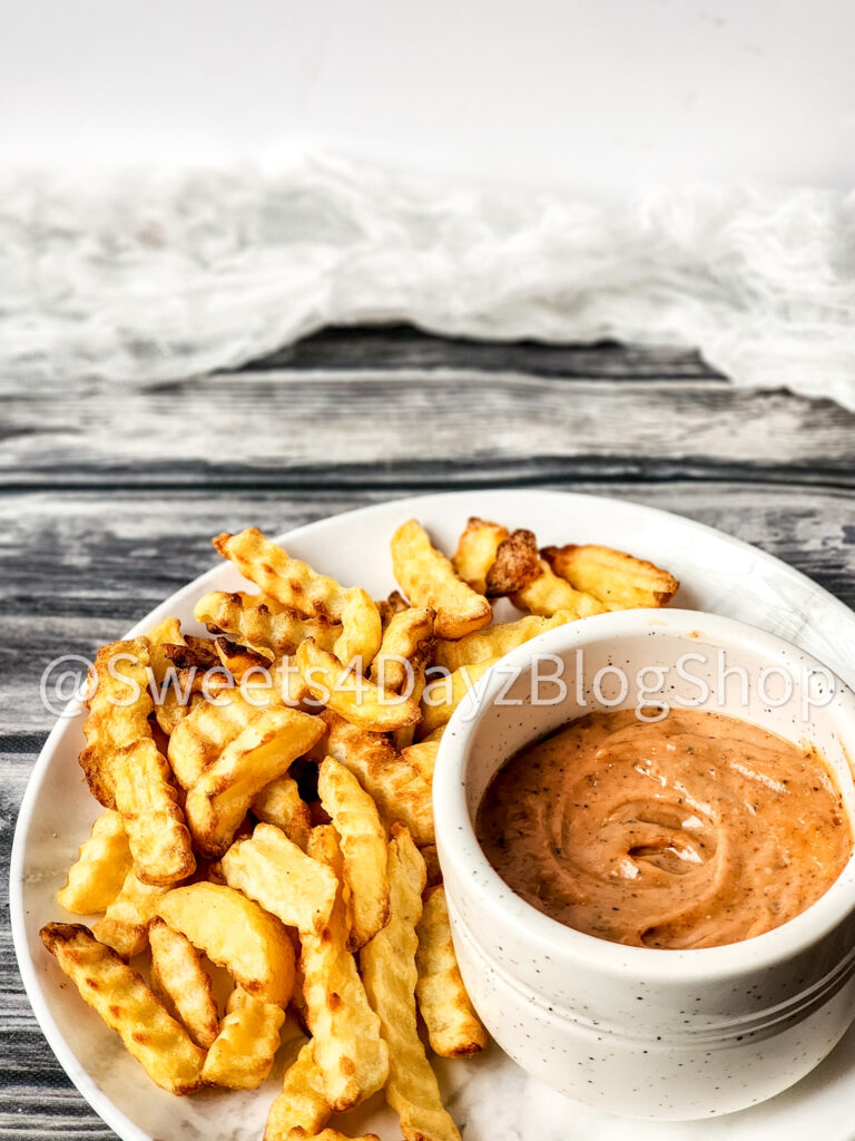 Copycat Raisin Cane's Sauce on Grey Wood