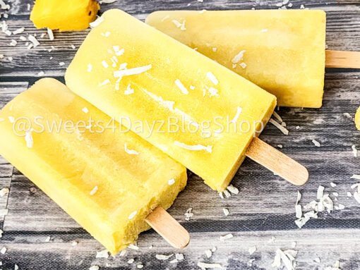 Pineapple Coconut Popsicles on Grey Wood - Image 4