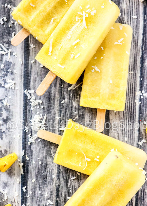 Pineapple Coconut Popsicles on Grey Wood - Image 5