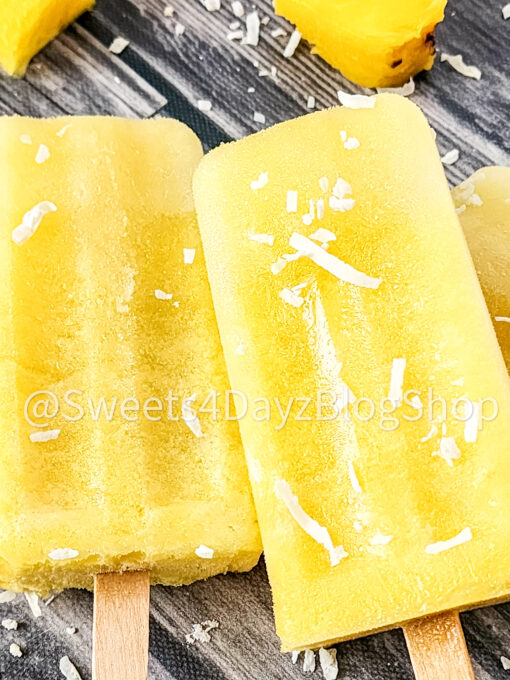 Pineapple Coconut Popsicles on Grey Wood - Image 7