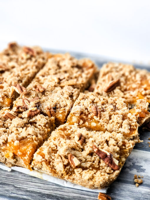 Brown Butter Crumbly Peach Bars on Grey Wood