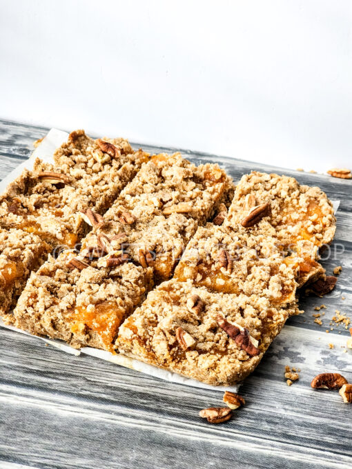 Brown Butter Crumbly Peach Bars on Grey Wood - Image 3