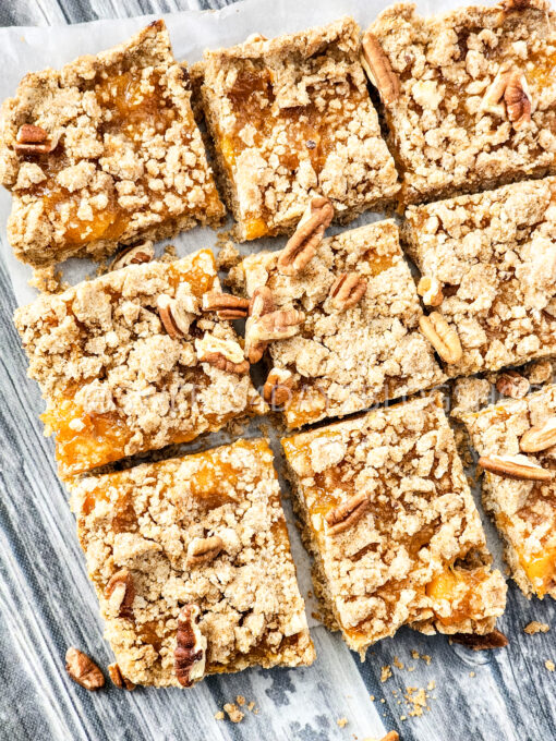 Brown Butter Crumbly Peach Bars on Grey Wood - Image 4