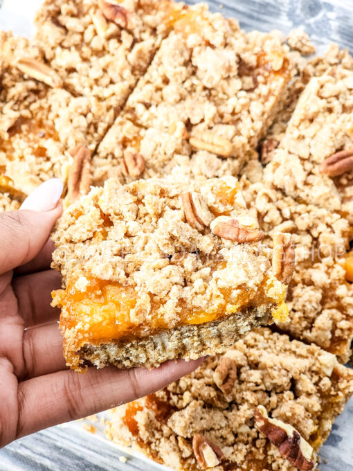 Brown Butter Crumbly Peach Bars on Grey Wood - Image 9