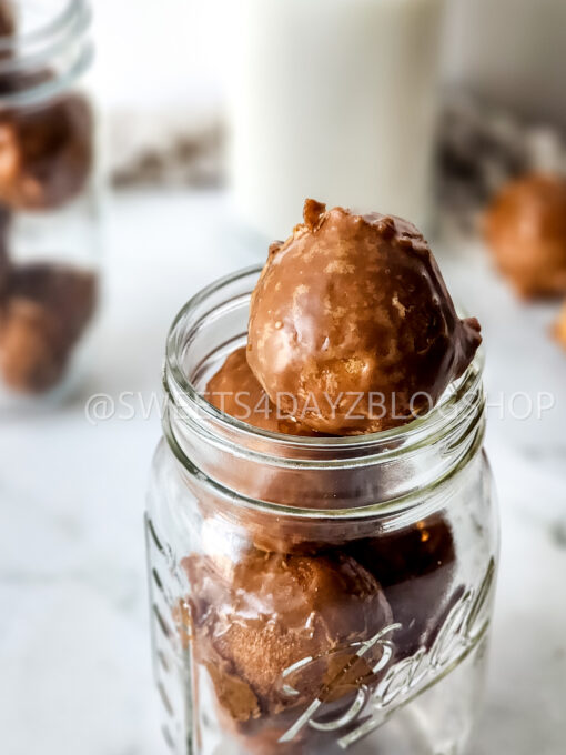 Coffee Glazed Donut Holes on Marble - Image 3
