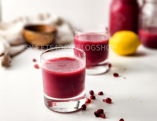 Homemade Pomegranate Juice on White - Image 3