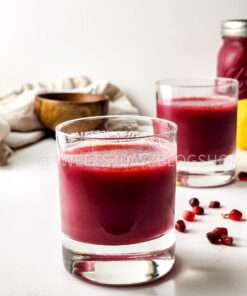 Homemade Pomegranate Juice on White