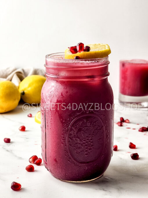 Homemade Pomegranate Juice on Marble - Image 2