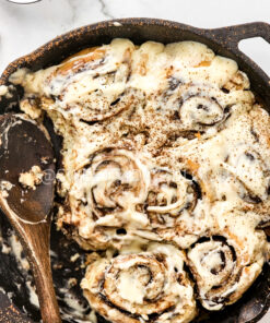 Cast Iron Chocolate Caramel Cinnamon Rolls on Marble