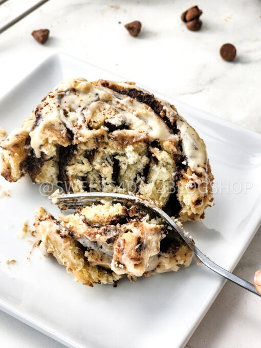Cast Iron Chocolate Caramel Cinnamon Rolls on Marble - Image 4