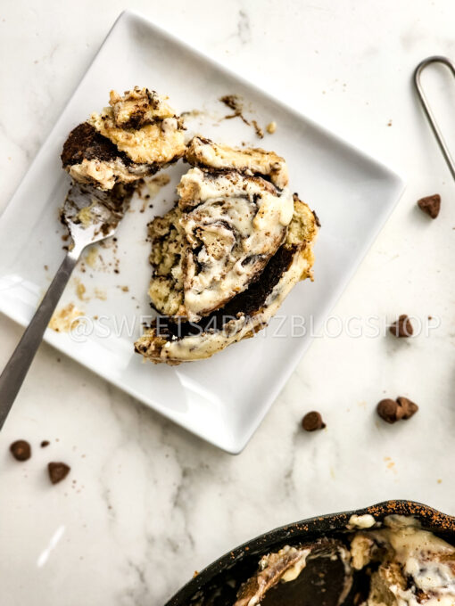 Cast Iron Chocolate Caramel Cinnamon Rolls on Marble - Image 3