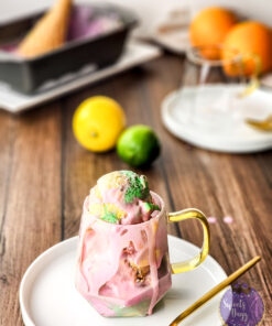 Homemade Rainbow Sherbet on Brown Wood