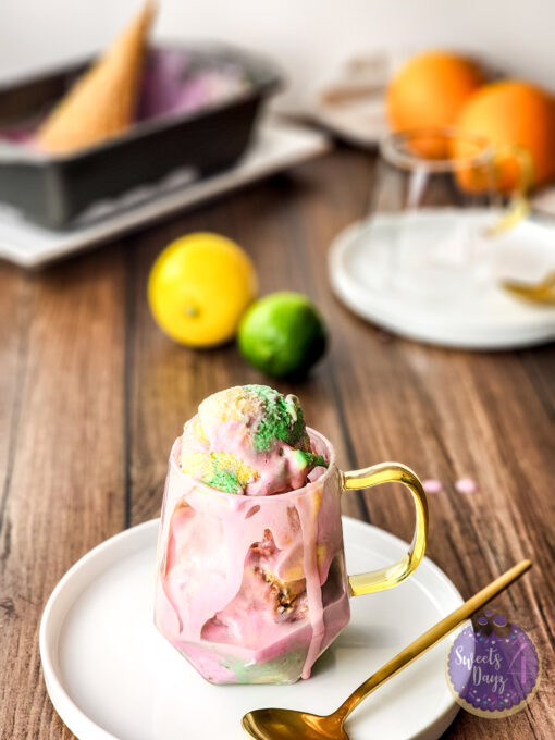Homemade Rainbow Sherbet on Brown Wood