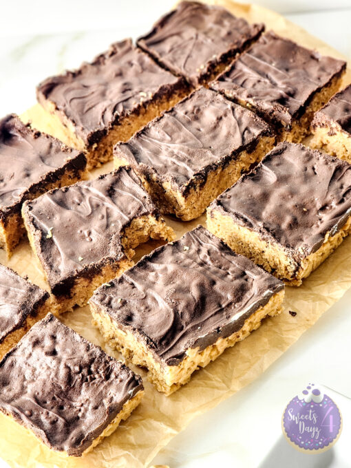 Peanut Butter Chocolate Rice Krispy Treats on Gold Marble - Image 8