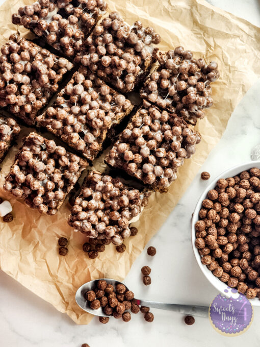 Chocolate Marshmallow Gooey Bars on Marble - Image 2