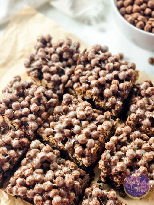 Chocolate Marshmallow Gooey Bars on Marble - Image 5