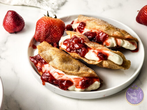 Strawberry Cheesecake Dessert Tacos on Marble - Image 2