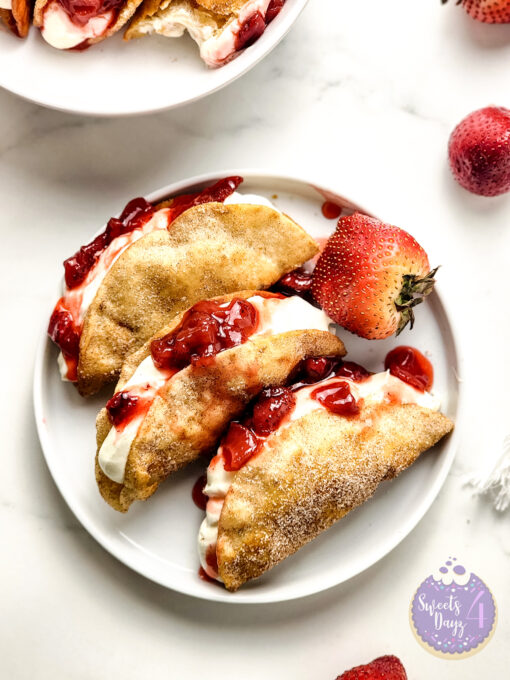 Strawberry Cheesecake Dessert Tacos on Marble - Image 3