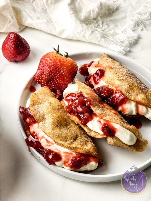 Strawberry Cheesecake Dessert Tacos on Marble - Image 4