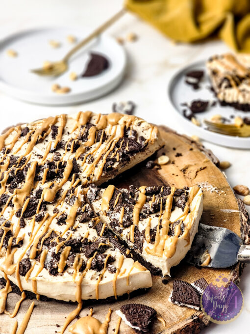 No Bake Peanut Butter Oreo Cheesecake on Gold Marble - Image 3