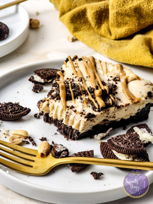 No Bake Peanut Butter Oreo Cheesecake on Gold Marble - Image 8