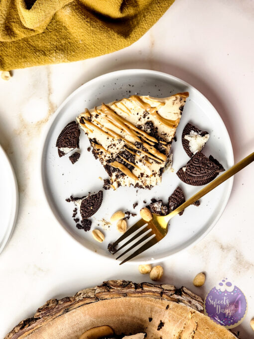 No Bake Peanut Butter Oreo Cheesecake on Gold Marble - Image 10