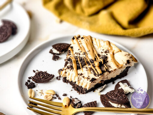 No Bake Peanut Butter Oreo Cheesecake on Gold Marble - Image 9