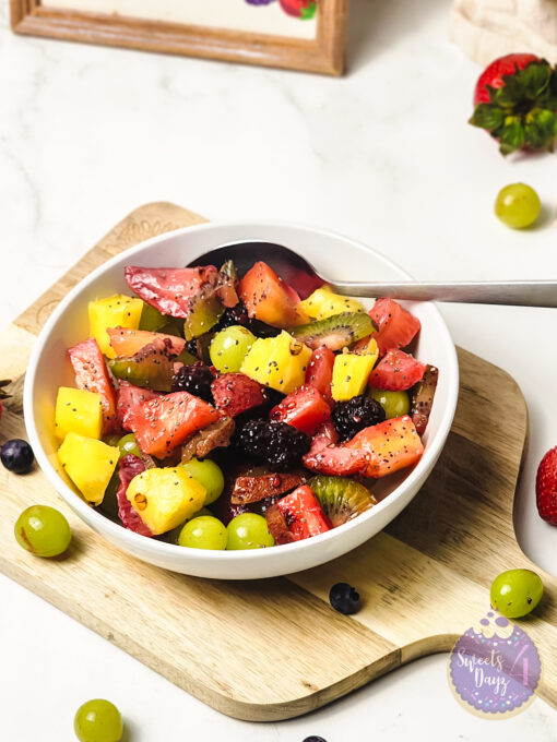 Lemon Poppyseed Fruit Salad on Marble - Image 2