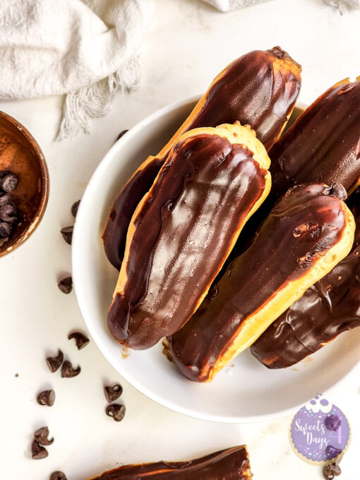 Chocolate Eclairs on Gold Marble - Image 3