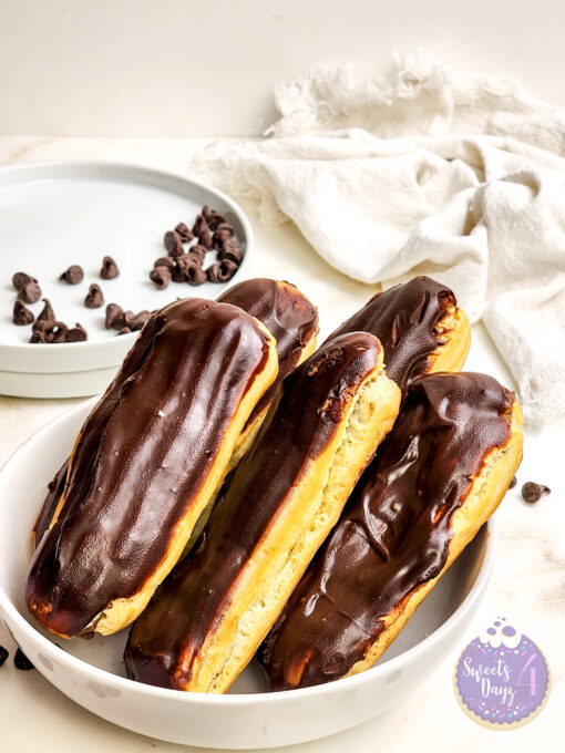 Chocolate Eclairs on Gold Marble - Image 4