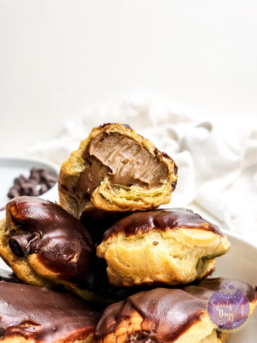 Chocolate Eclairs on Gold Marble - Image 5
