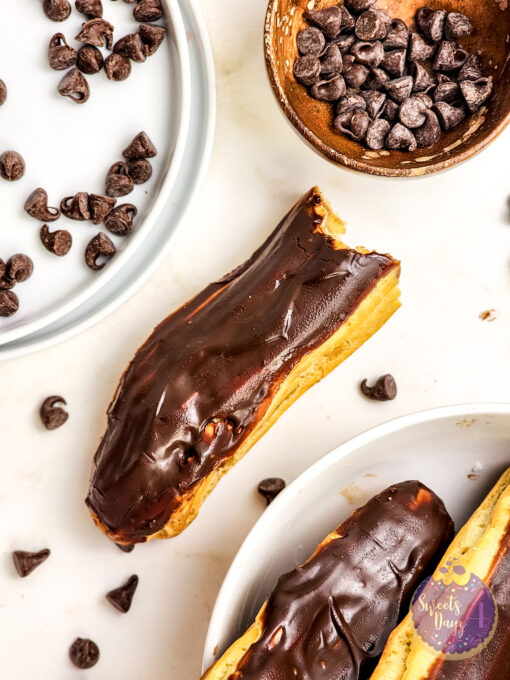 Chocolate Eclairs on Gold Marble - Image 6