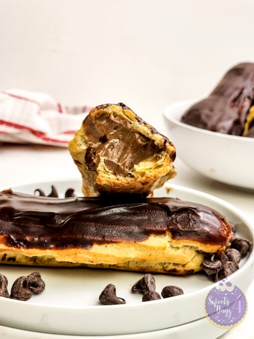 Chocolate Eclairs on Marble - Image 2