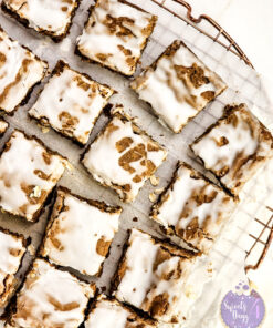 Iced Oatmeal Cookie Bars on Gold Marble