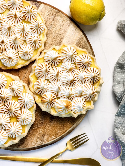 Lemon Meringue Tarts on Gold Marble