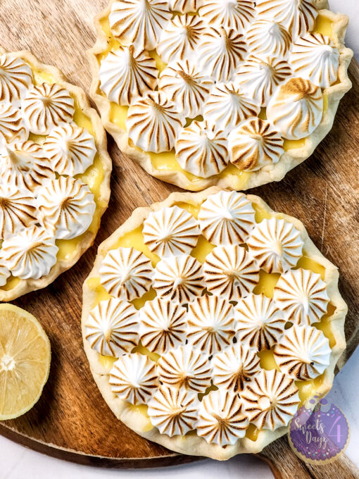 Lemon Meringue Tarts on Gold Marble - Image 10