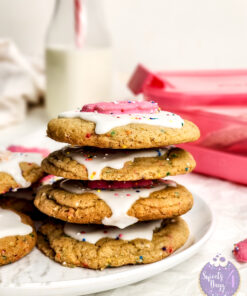 Frosted Animal Cracker Cookies on Marble