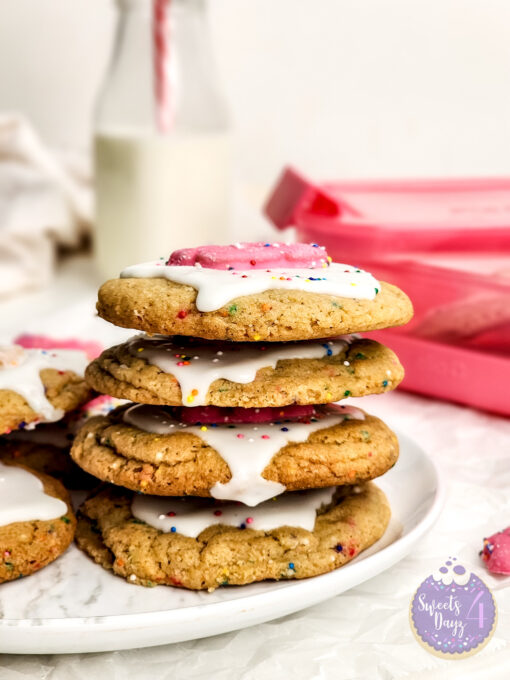 Frosted Animal Cracker Cookies on Marble