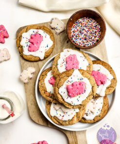 Frosted Animal Cracker Cookies on Gold Marble