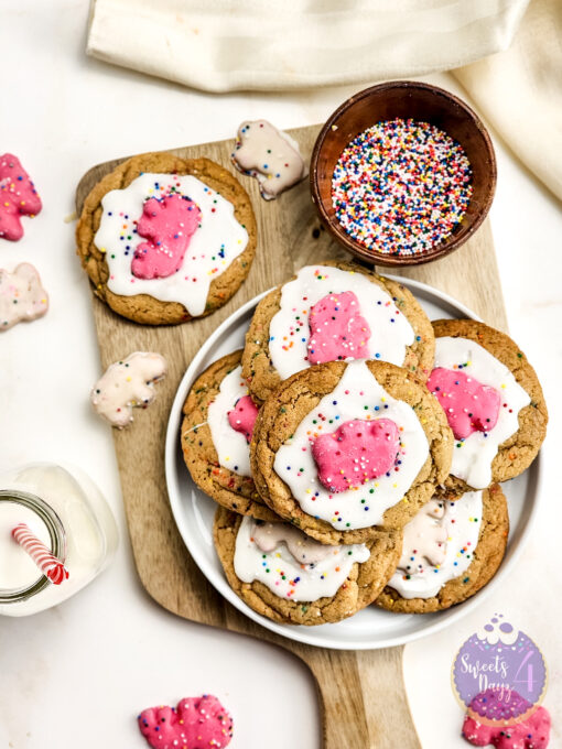 Frosted Animal Cracker Cookies on Gold Marble